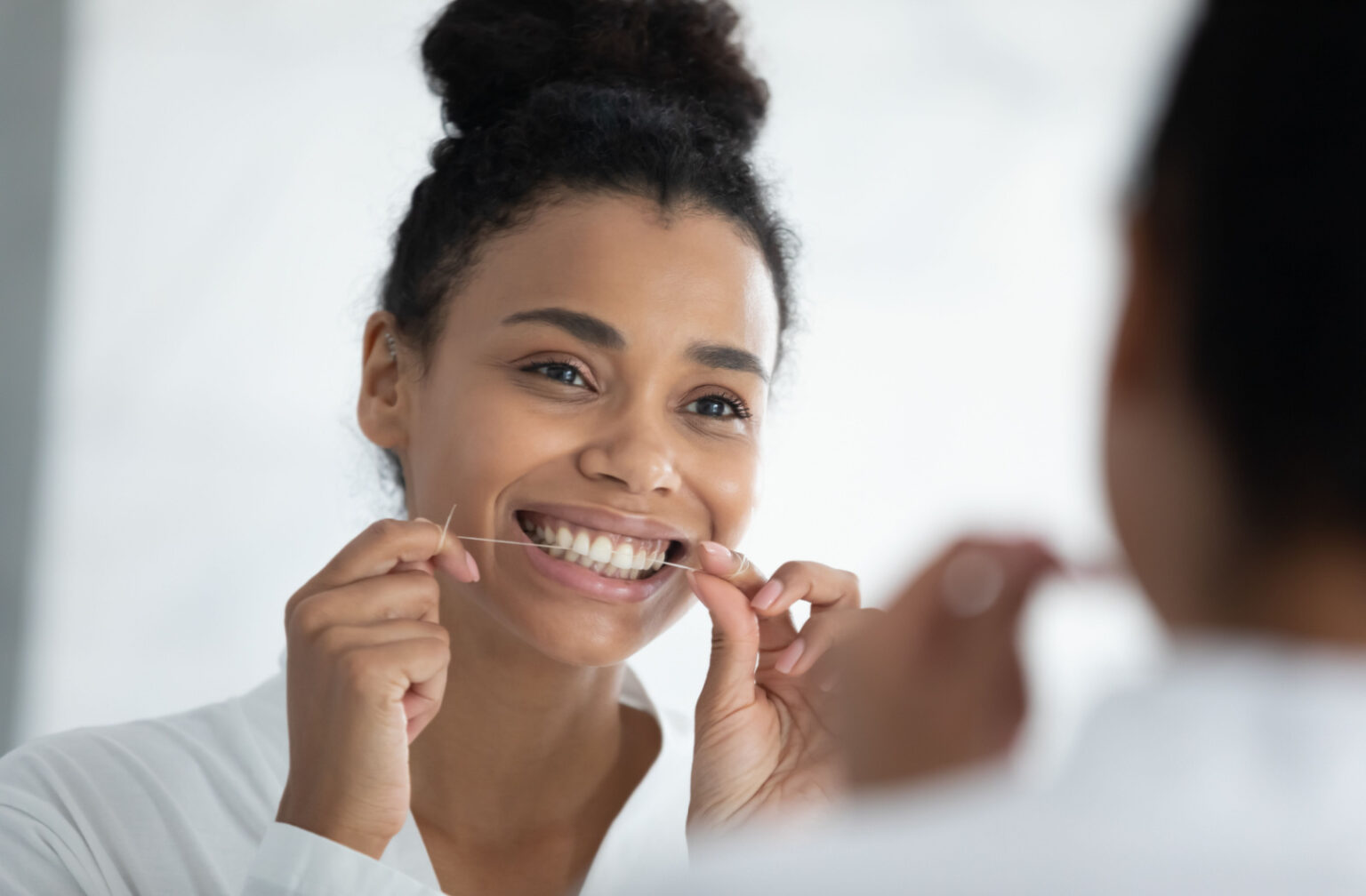 Why Do My Gums Bleed When I Floss? | False Creek Dental